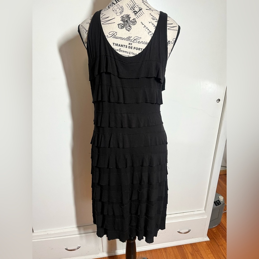 Black “distressed flapper” dress.